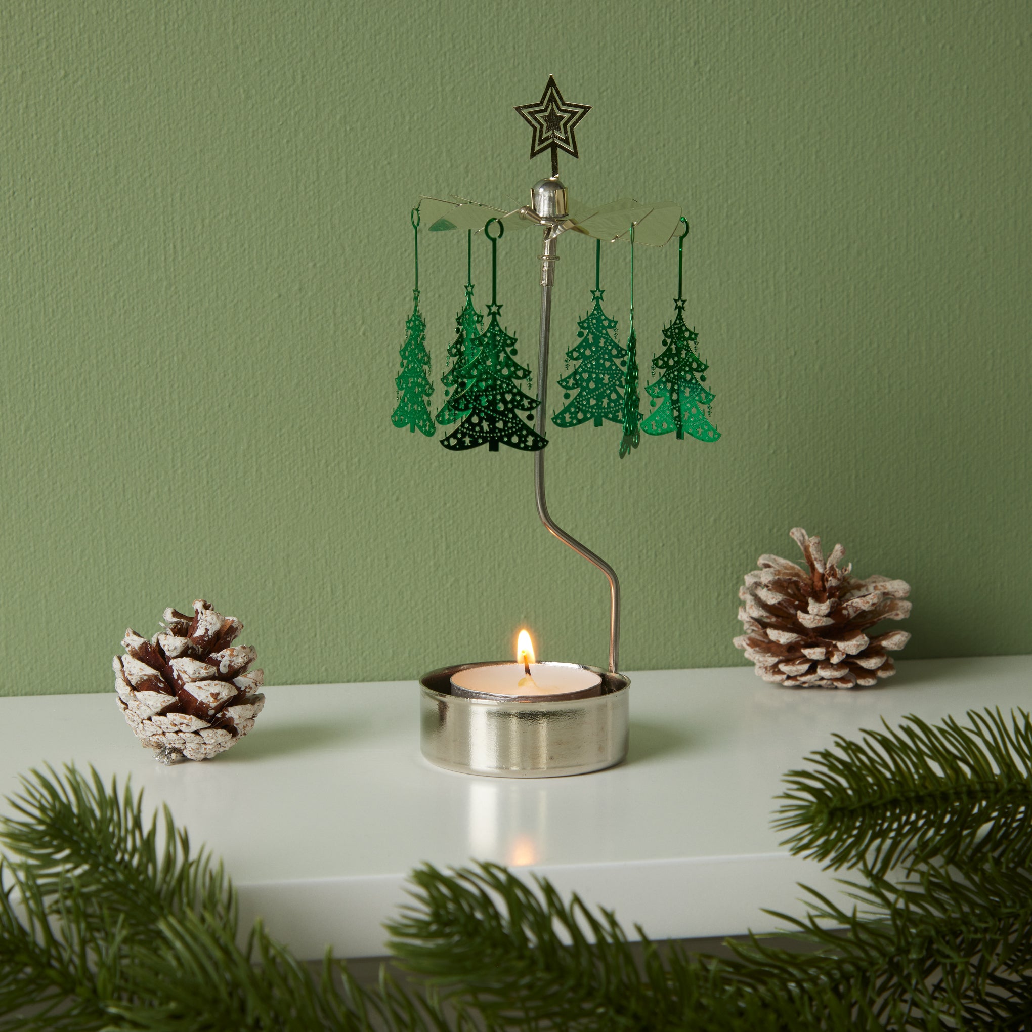 Rotating Tree Candle Holder – MoMA Design Store