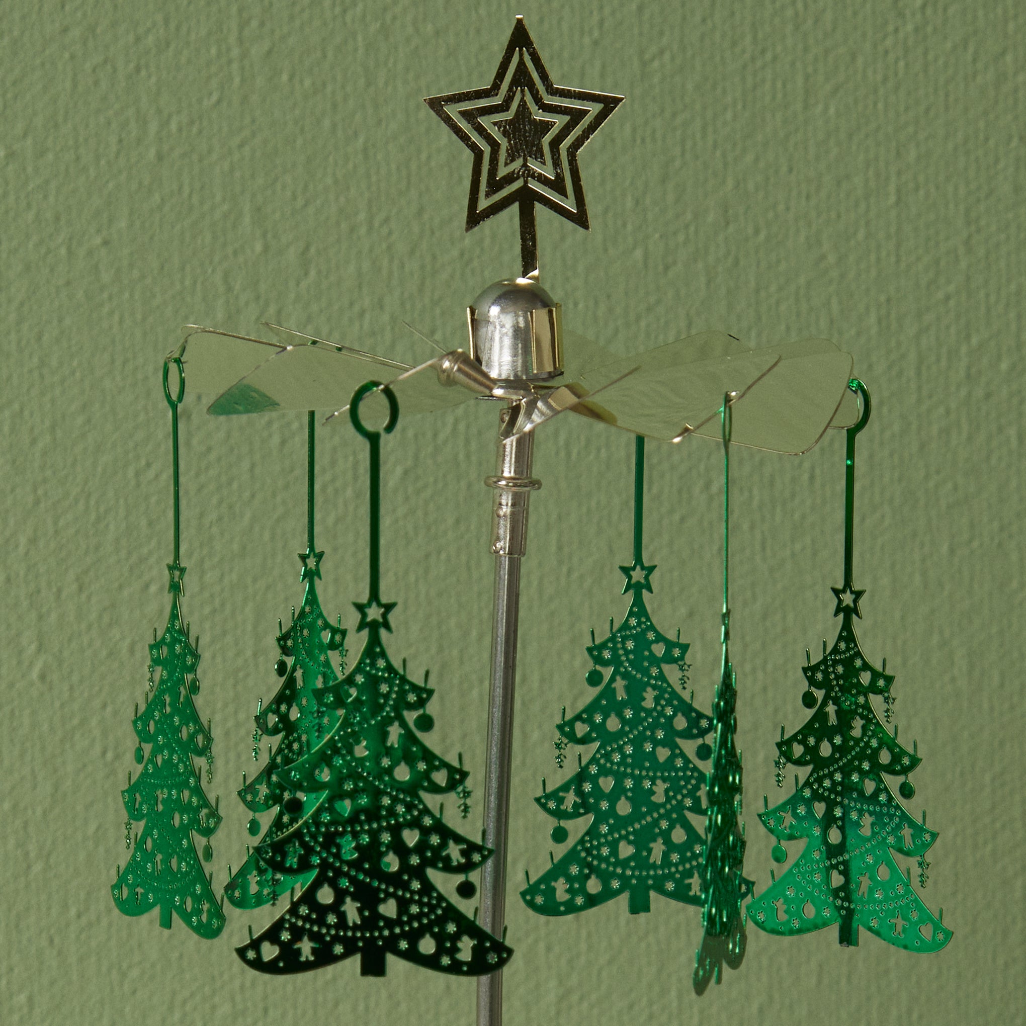 Rotating Tree Candle Holder – MoMA Design Store